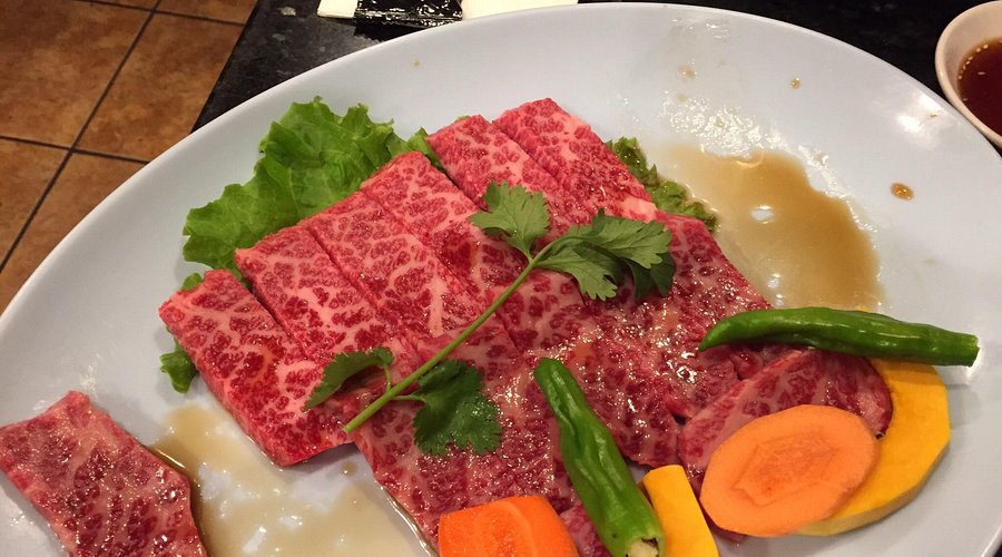 Tsuruhashi Japanese BBQ signature dishes Prime Kalbi Short Rib, Harami Miso Skirt Steak, Beef Tongue, Assorted Kimchi